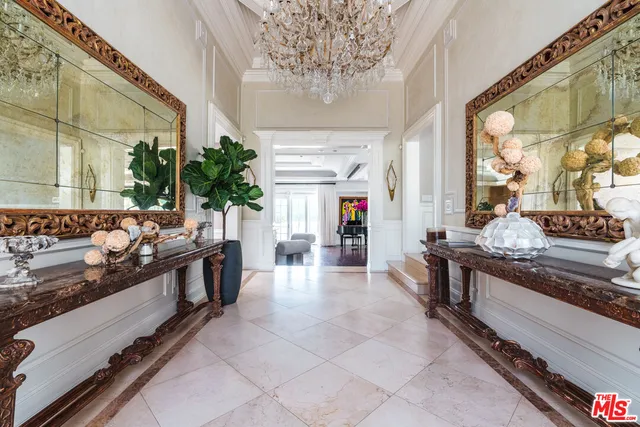 a large kitchen with stainless steel appliances granite countertop a stove and a large window