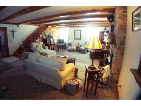 743 Battlefield Road Fort Defiance, VA 24437 - Photo 12 of 12 a living room with furniture and a potted plant