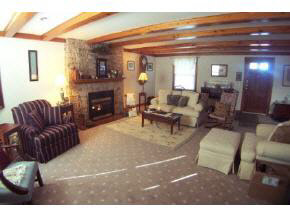 743 Battlefield Road Fort Defiance, VA 24437 - Photo 5 of 12 a living room with furniture and a fireplace