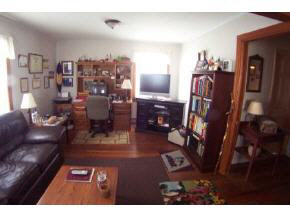 743 Battlefield Road Fort Defiance, VA 24437 - Photo 7 of 12 a living room with furniture and a flat screen tv