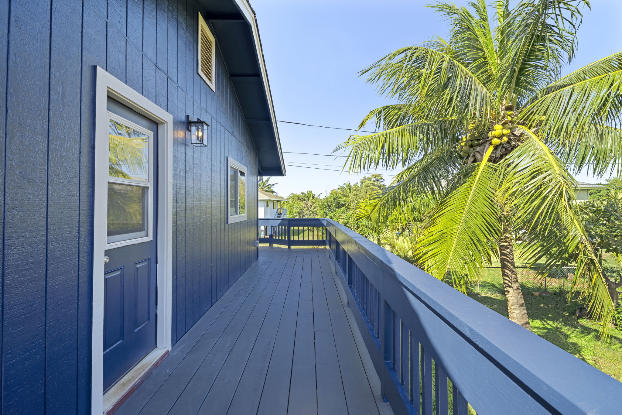 4431 Iona Road Hanapepe, HI 96705 - Photo 2 of 20 a view of balcony with wooden floor