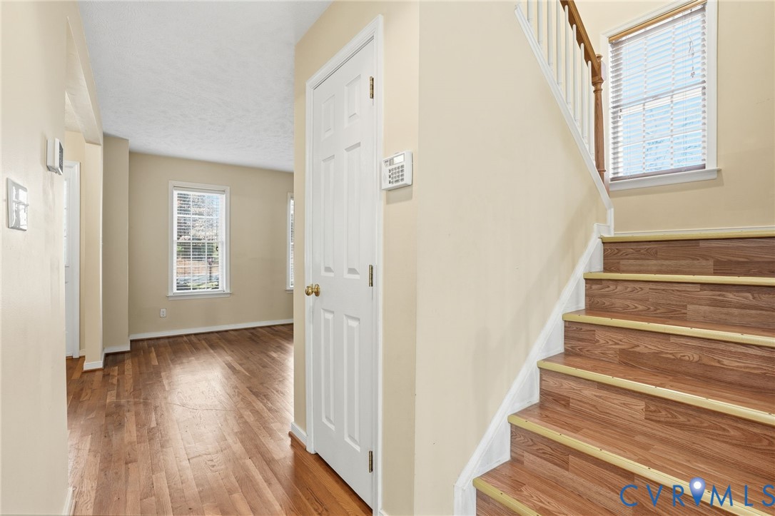 6093 Homehills Road Mechanicsville, VA 23111 - Photo 22 of 50 a view of an entryway with wooden floor and door