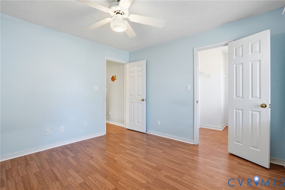 6093 Homehills Road Mechanicsville, VA 23111 - Photo 30 of 50 a view of an empty room with wooden floor