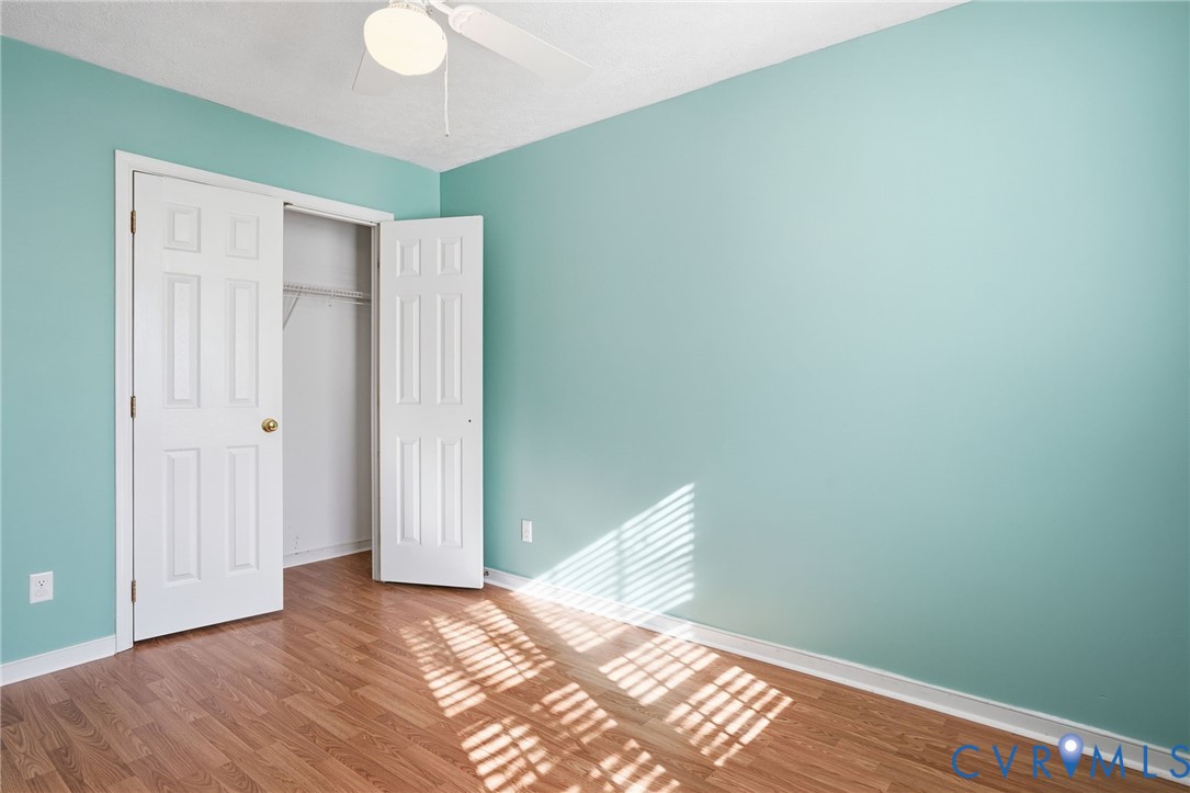 6093 Homehills Road Mechanicsville, VA 23111 - Photo 31 of 50 a view of a room with wooden floor and white walls