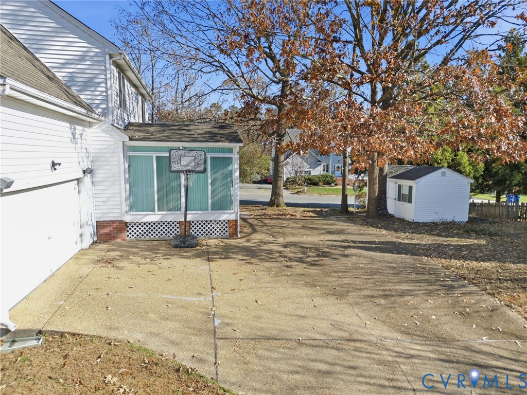 6093 Homehills Road Mechanicsville, VA 23111 - Photo 44 of 50 a view of a house with a snow on the road