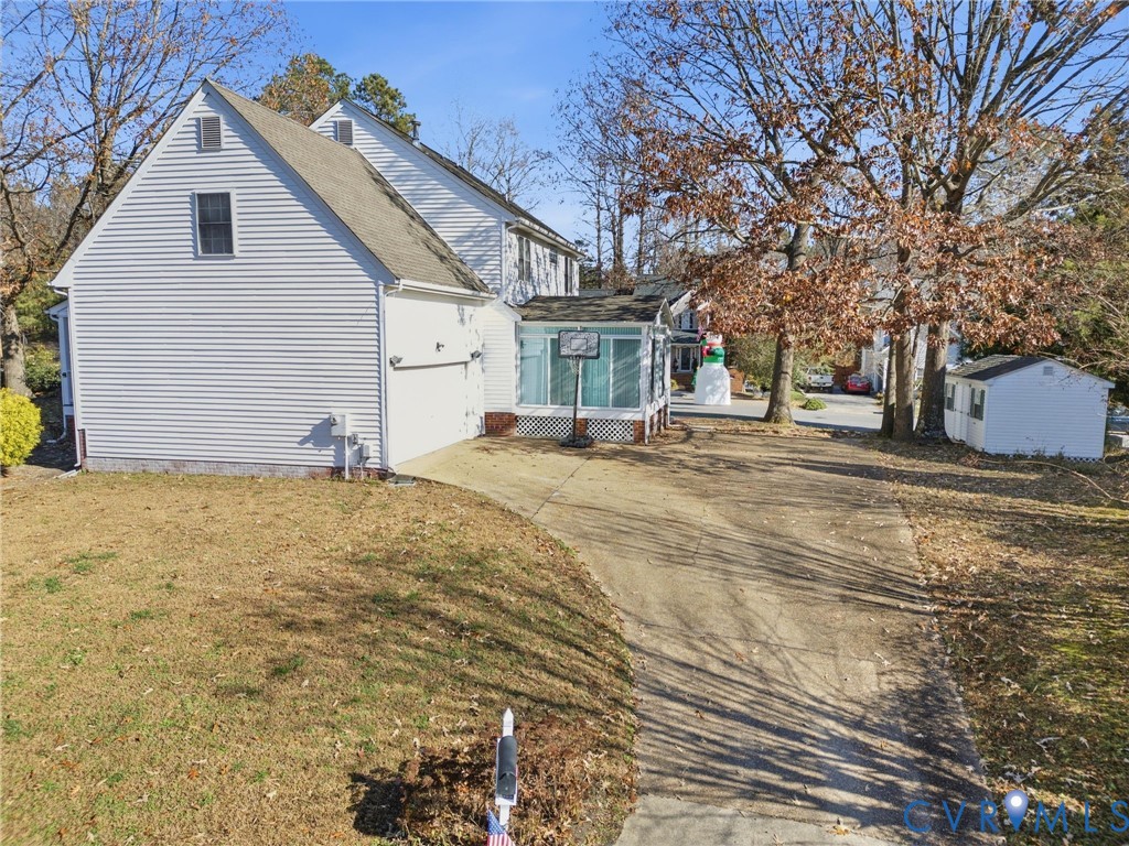 6093 Homehills Road Mechanicsville, VA 23111 - Photo 45 of 50 a view of a yard with a house