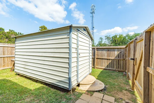 a view of a backyard with a garden