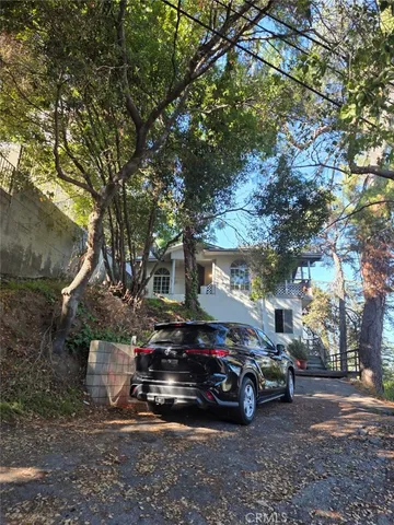 a view of a car in a lot