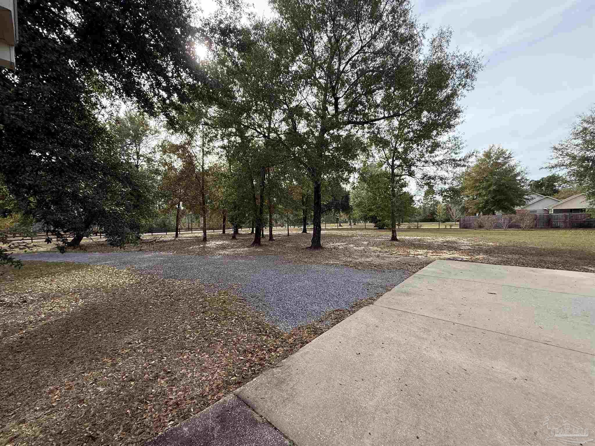 7223 Martin Road Milton, FL 32570 - Photo 25 of 28 a view of outdoor space with tree s