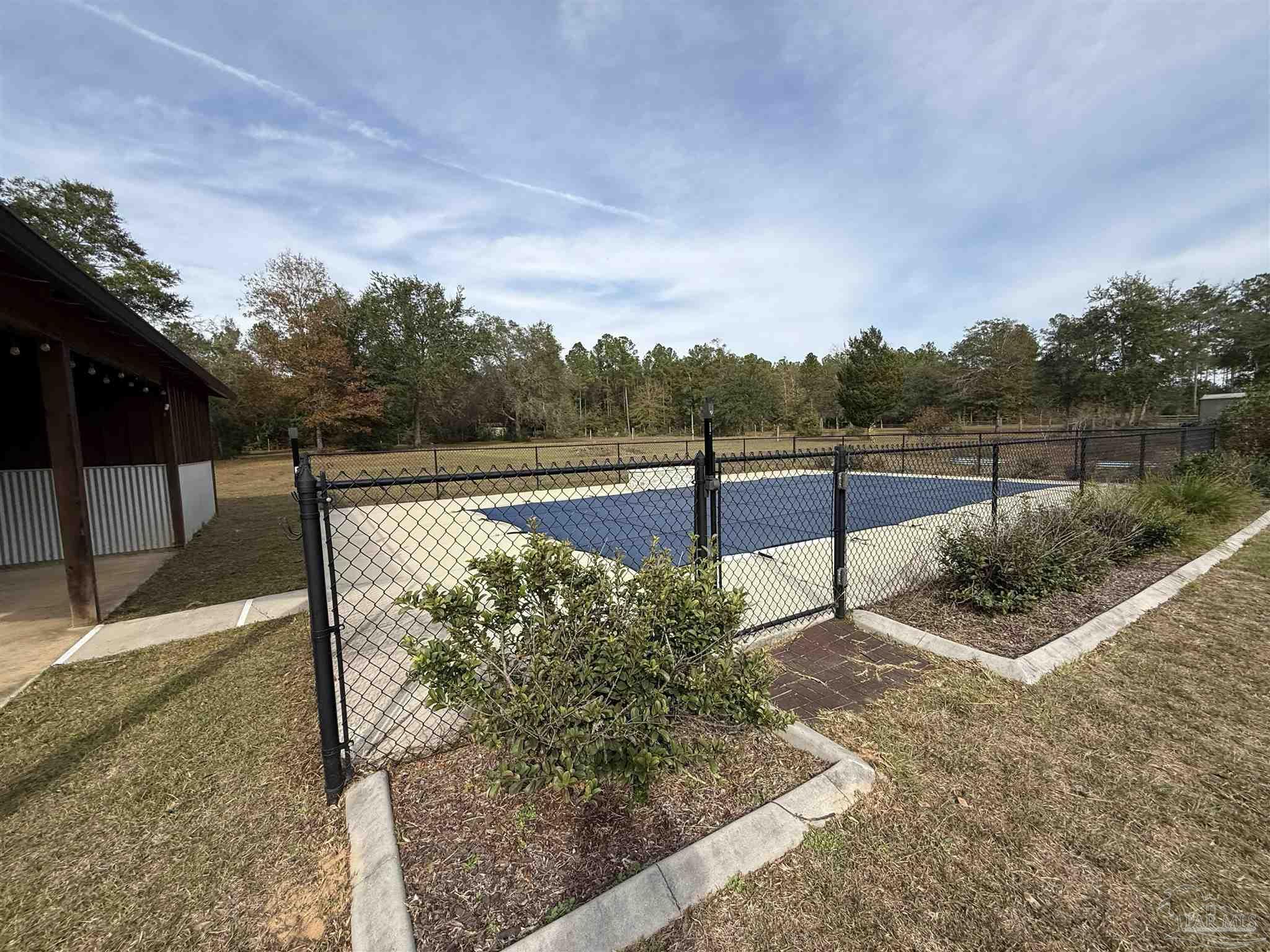 7223 Martin Road Milton, FL 32570 - Photo 3 of 28 a view of a forest