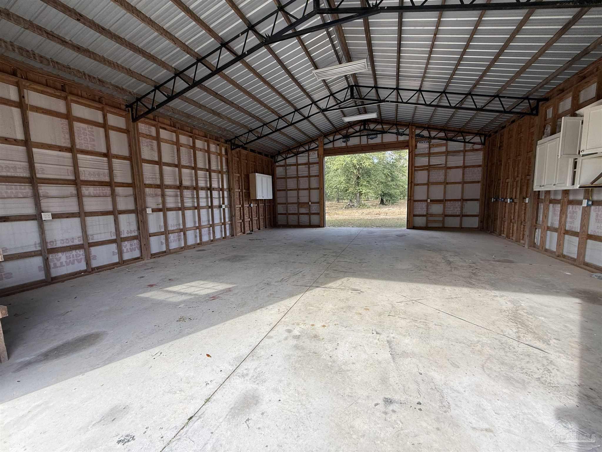7223 Martin Road Milton, FL 32570 - Photo 5 of 28 a view of a garage