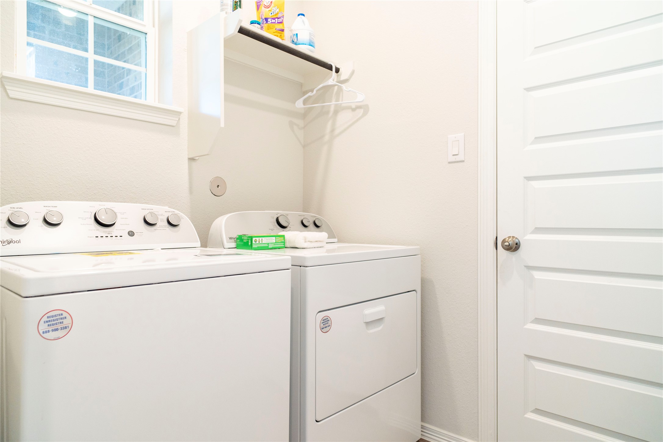 23319 Spring Genesis Lane Katy, TX 77493 - Photo 13 of 22 a utility room with dryer and washer