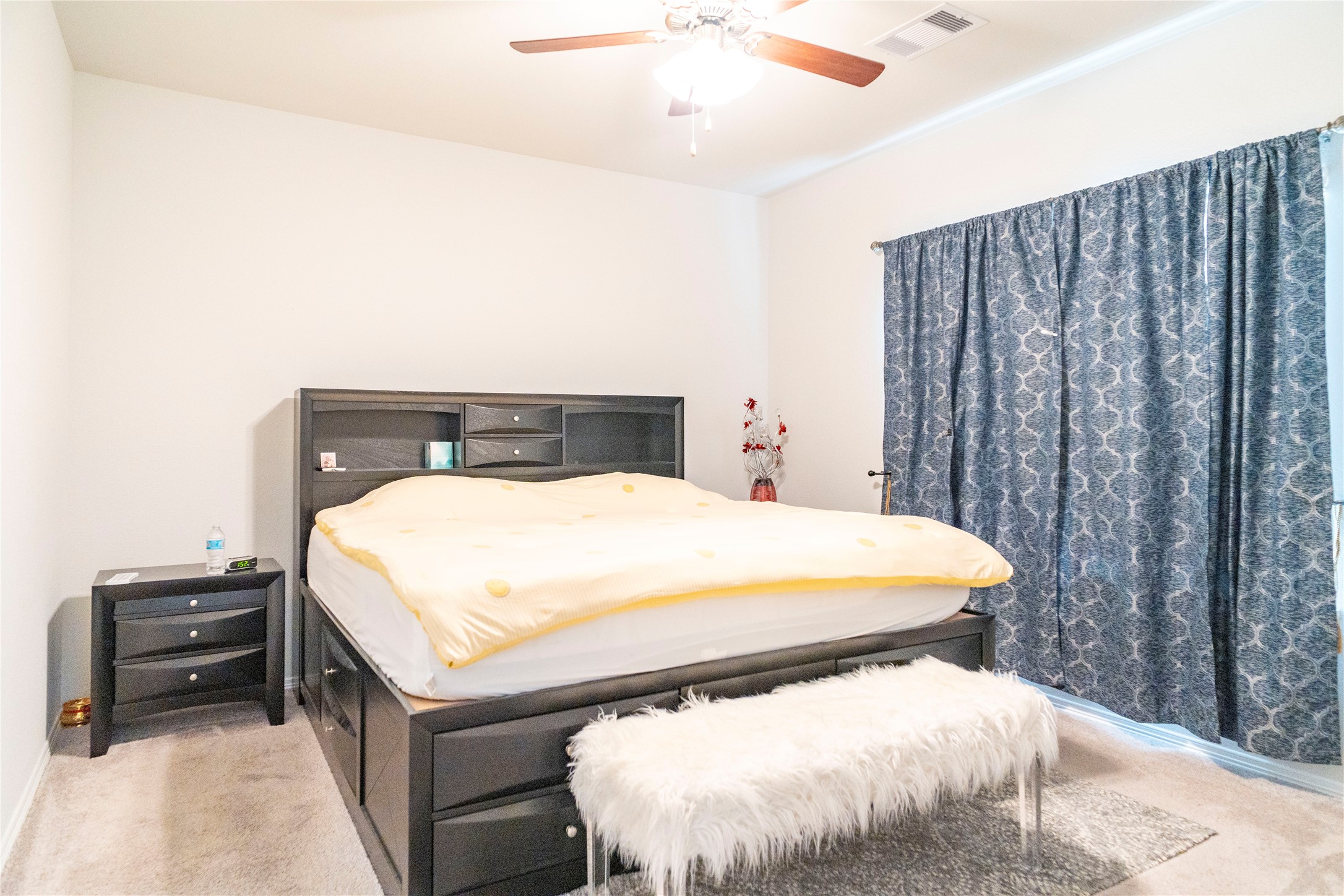 23319 Spring Genesis Lane Katy, TX 77493 - Photo 15 of 22 a bedroom with a bed and a tv