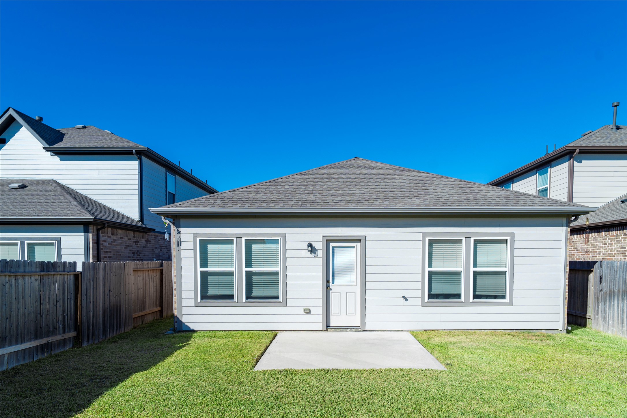 23319 Spring Genesis Lane Katy, TX 77493 - Photo 18 of 22 a house view with a garden space