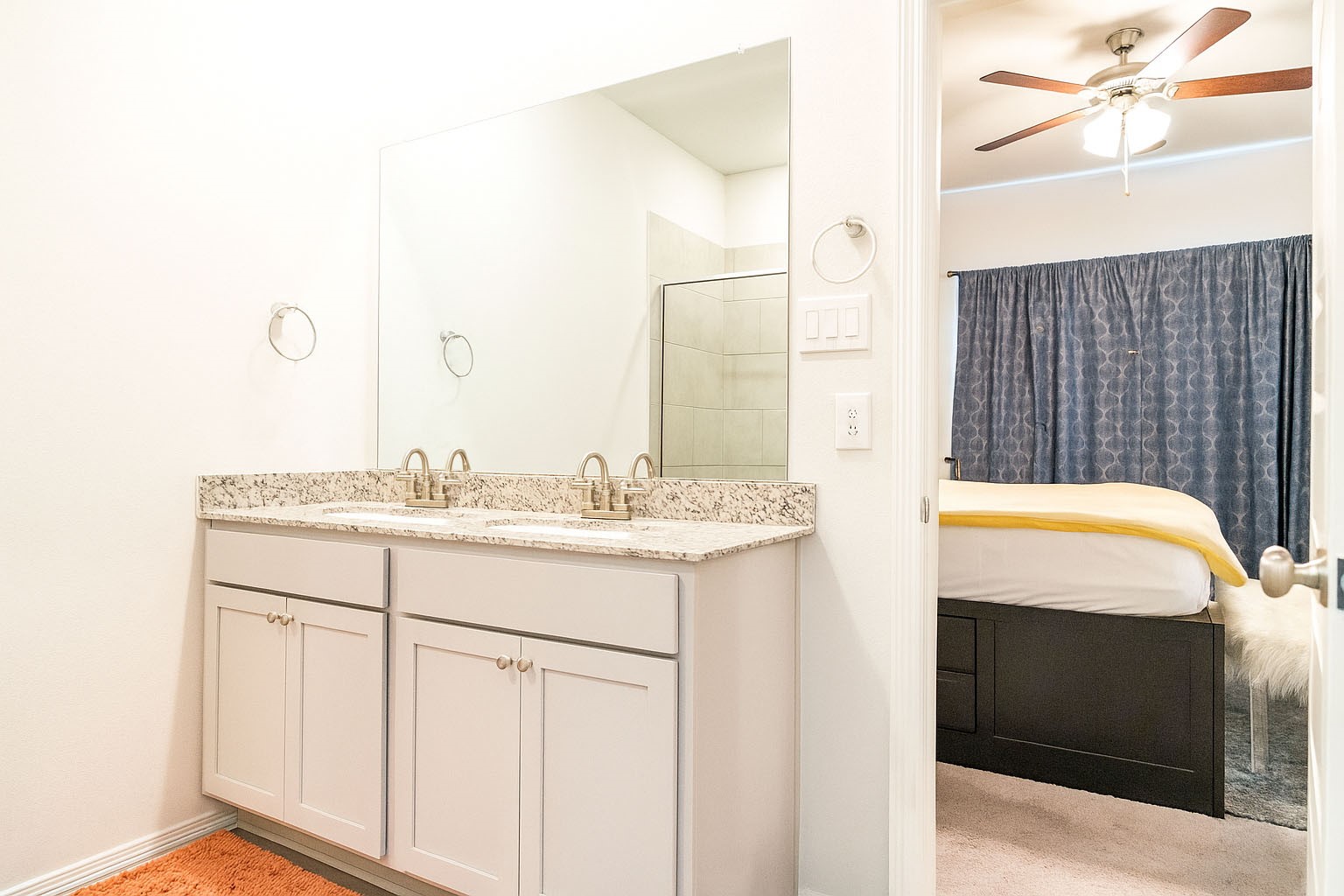 23319 Spring Genesis Lane Katy, TX 77493 - Photo 8 of 22 a bathroom with a sink and a mirror