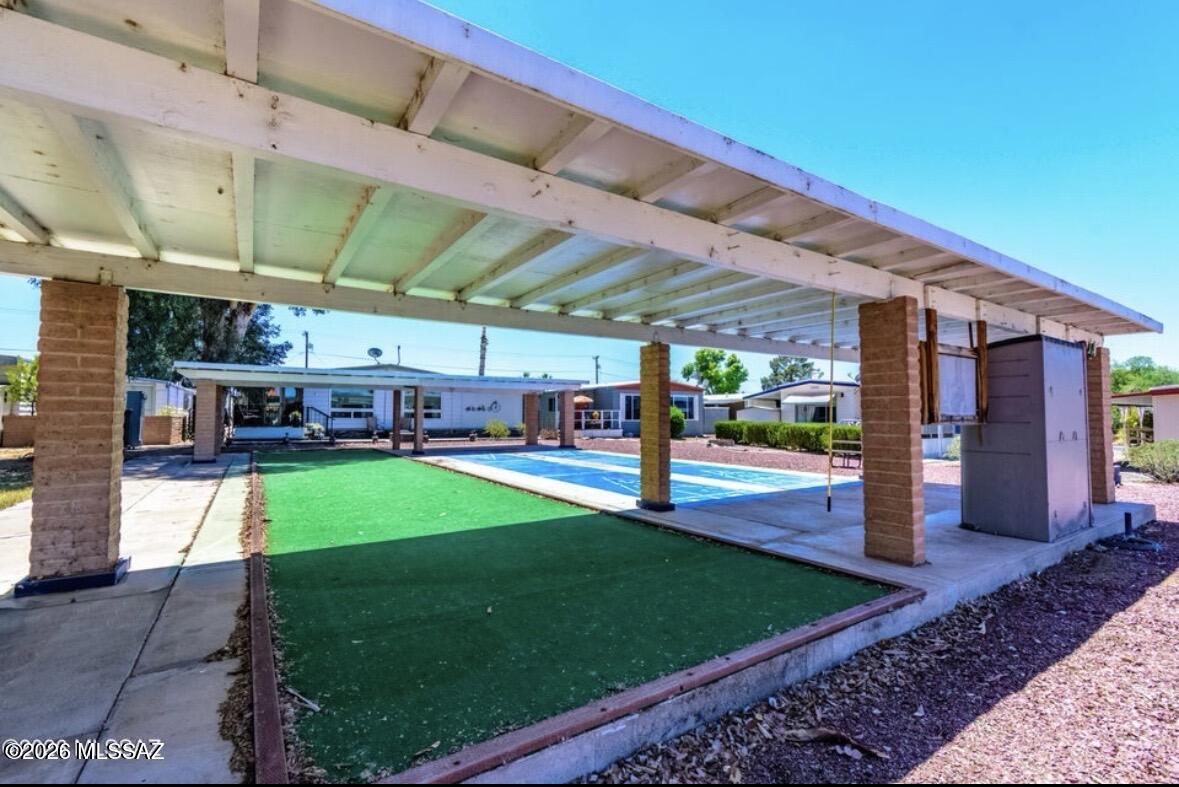 4550 North Flowing Wells Road, Unit 65 Tucson, AZ 85705 - Photo 47 of 50 a view of a backyard with swimming pool