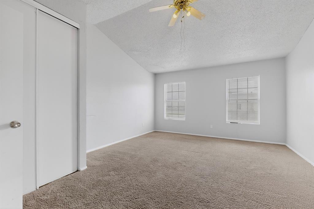 9467 Olde Towne Row Dallas, TX 75227 - Photo 11 of 26 a view of an empty room with a window