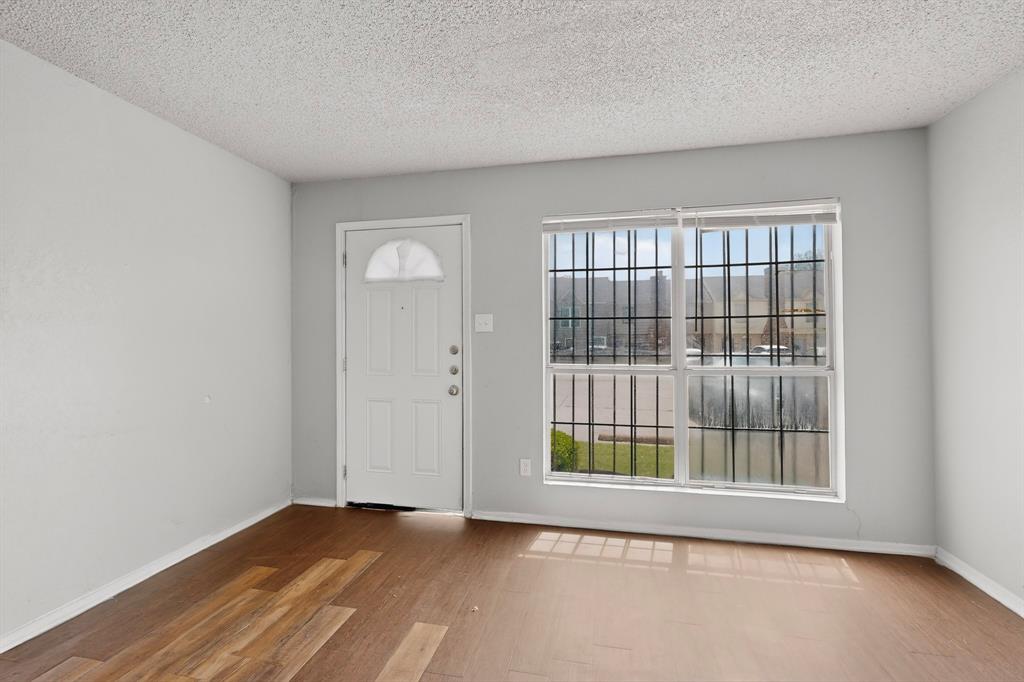 9467 Olde Towne Row Dallas, TX 75227 - Photo 26 of 26 a view of an empty room with a window