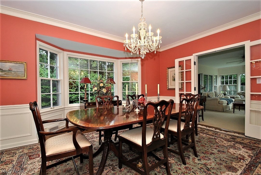 2767 Inverness Road Shaker Heights, OH 44122 - Photo 11 of 35 Formal dining room boasts bay window, detail molding and French doors to Family Room