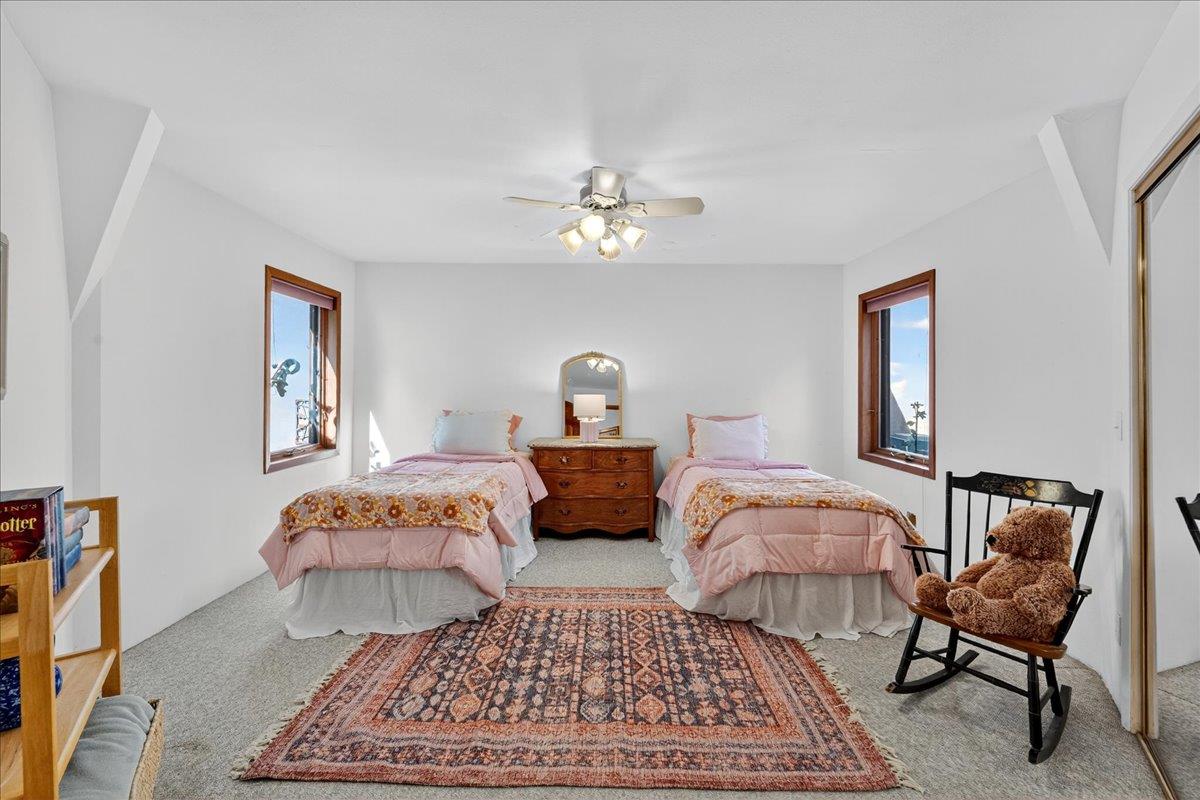 5224 Twin Falls Road Morgan Hill, CA 95037 - Photo 50 of 111 a bedroom with a bed a dresser and chair