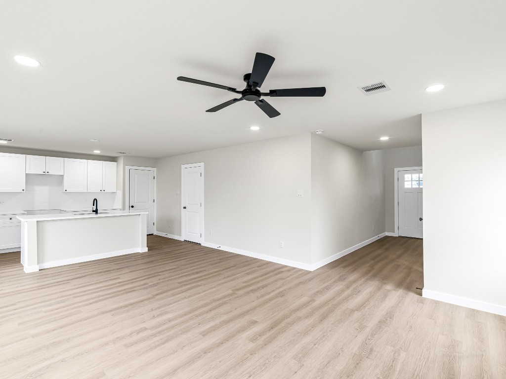 1006 4th Street Hempstead, TX 77445 - Photo 8 of 29 a view of a kitchen with a sink and a window