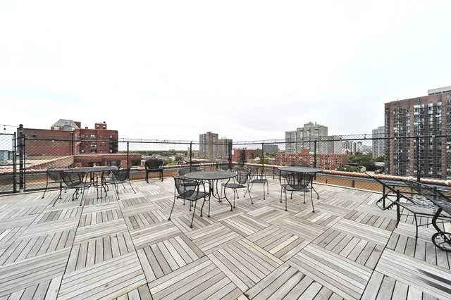 a view of a terrace with furniture