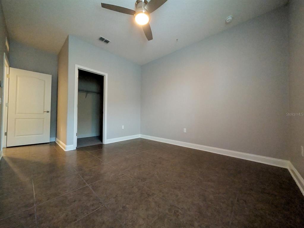 43 Turtle Ridge Drive Flagler Beach, FL 32136 - Photo 43 of 61 Bedroom 4 with walk-in closet view