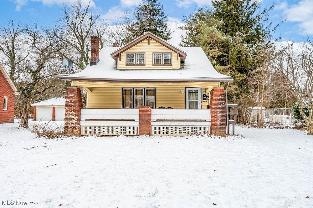 3114 Neosho Road Youngstown, OH 44511 - Photo 1 of 25 Bungalow with a porch and a chimney