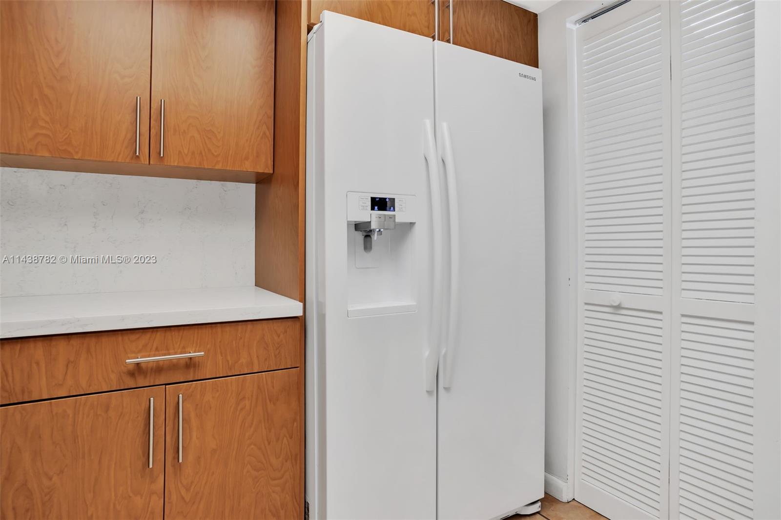 9140 Southwest 123rd Court, Unit 210Q Miami, FL 33186 - Photo 11 of 26 a bathroom with a shower