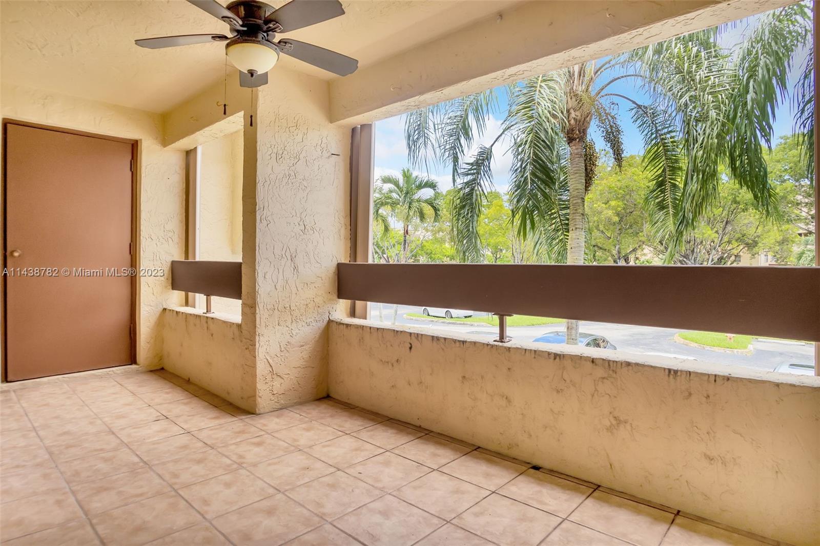 9140 Southwest 123rd Court, Unit 210Q Miami, FL 33186 - Photo 23 of 26 a view of entryway with a front door