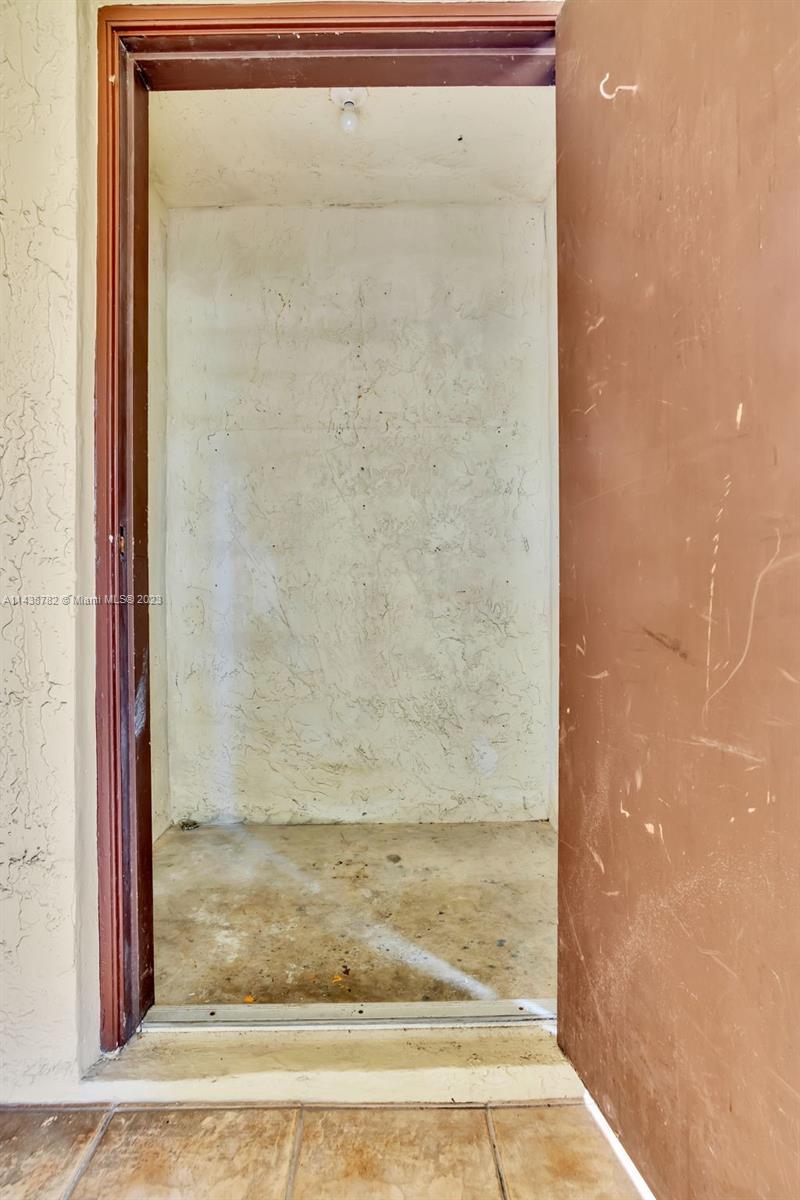 9140 Southwest 123rd Court, Unit 210Q Miami, FL 33186 - Photo 26 of 26 a view of a glass door