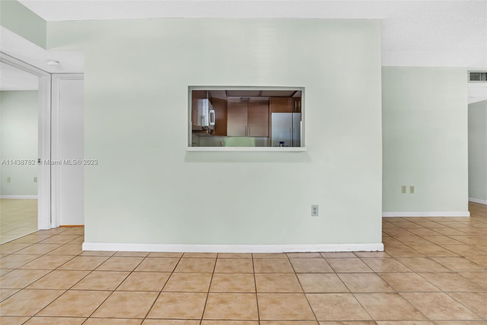 9140 Southwest 123rd Court, Unit 210Q Miami, FL 33186 - Photo 8 of 26 a view of an empty room