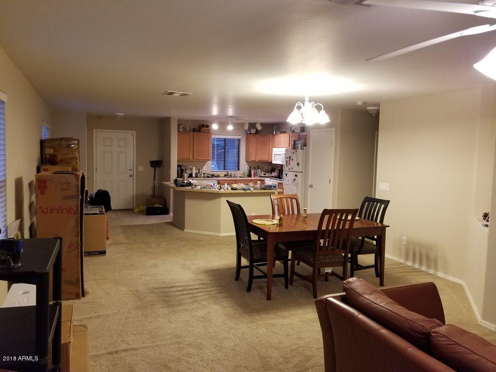 2721 South Powell Road Apache Junction, AZ 85119 - Photo 11 of 25 a view of a dining room with furniture