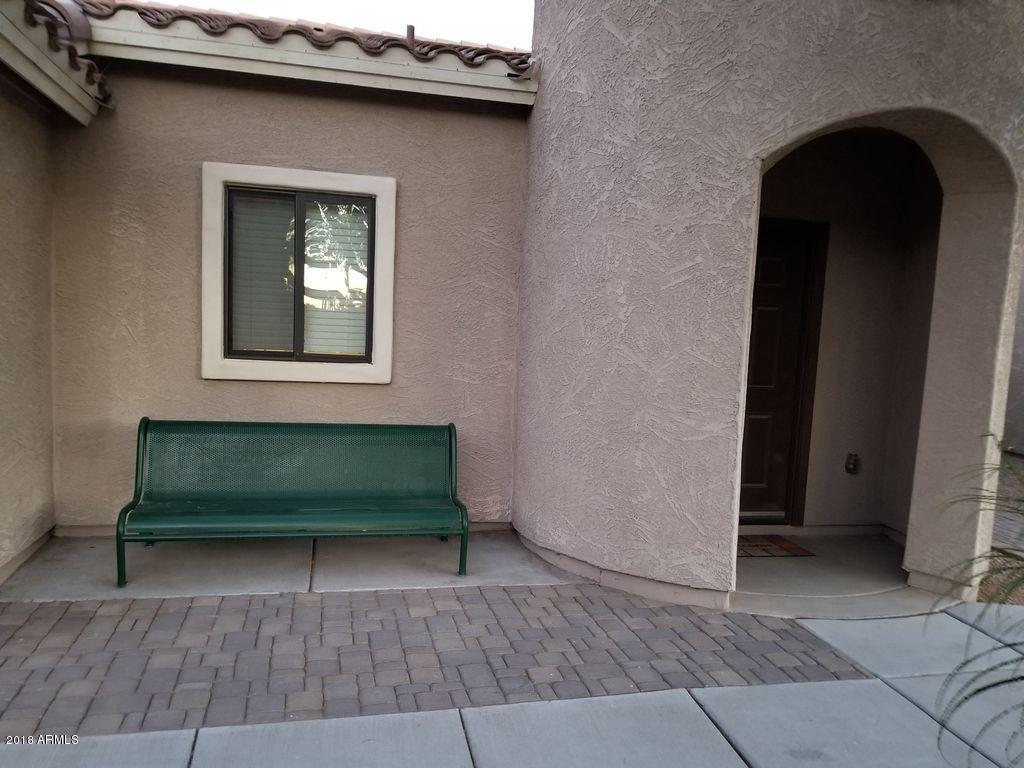 2721 South Powell Road Apache Junction, AZ 85119 - Photo 2 of 25 a view of outdoor space with wooden floor and seating space