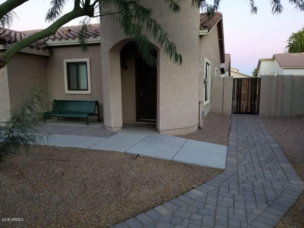 2721 South Powell Road Apache Junction, AZ 85119 - Photo 3 of 25 a view of a house with a yard