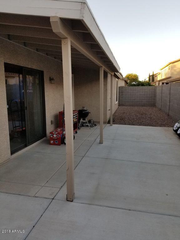 2721 South Powell Road Apache Junction, AZ 85119 - Photo 7 of 25 a view of a back yard of the house