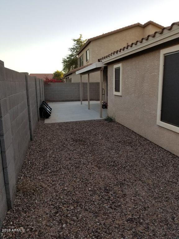 2721 South Powell Road Apache Junction, AZ 85119 - Photo 8 of 25 a backyard of a house