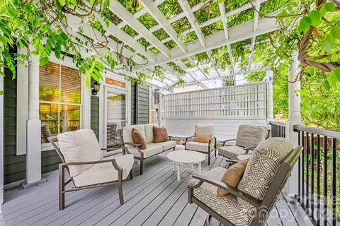 a outdoor living space with furniture and garden view
