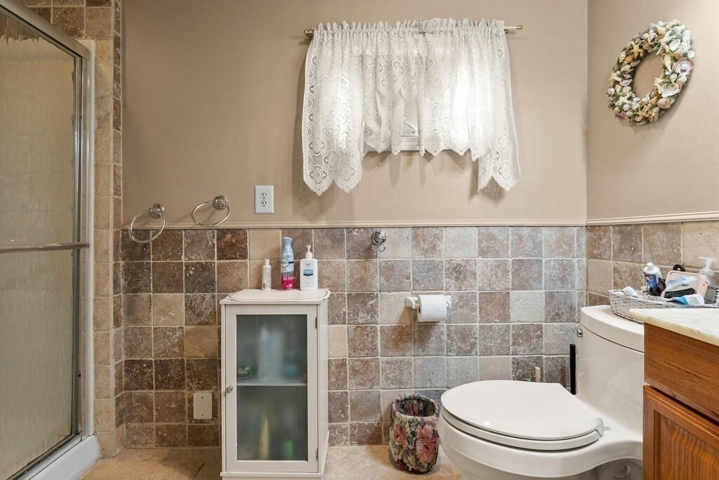 306 Andover Road Billerica, MA 01821 - Photo 17 of 42 a bathroom with a toilet and a sink