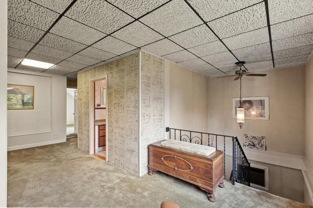 306 Andover Road Billerica, MA 01821 - Photo 19 of 42 a spacious bedroom with a bed and a table