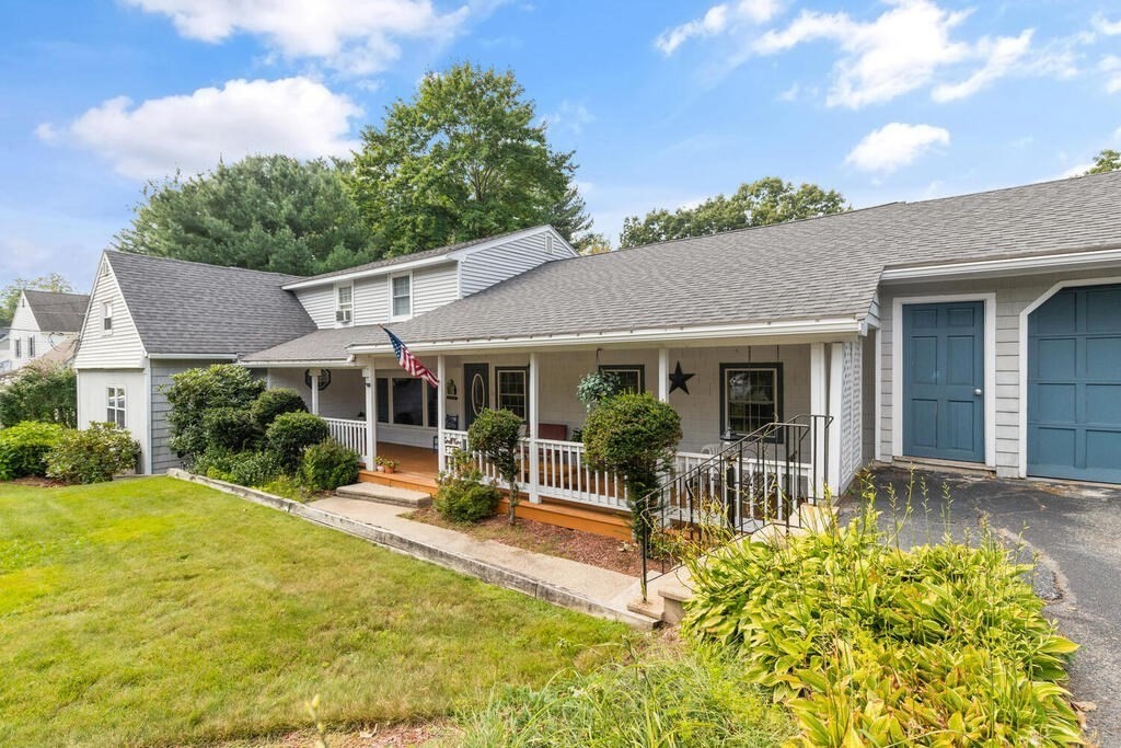 306 Andover Road Billerica, MA 01821 - Photo 2 of 42 a view of a house with backyard porch and sitting area