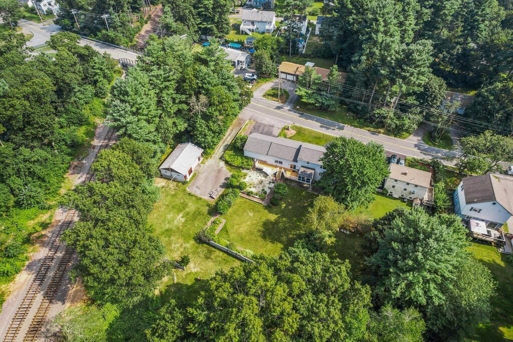 306 Andover Road Billerica, MA 01821 - Photo 38 of 42 an aerial view of a house with a yard
