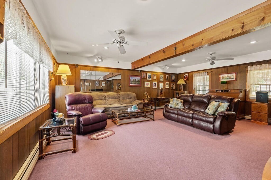 306 Andover Road Billerica, MA 01821 - Photo 5 of 42 a living room with furniture and a flat screen tv