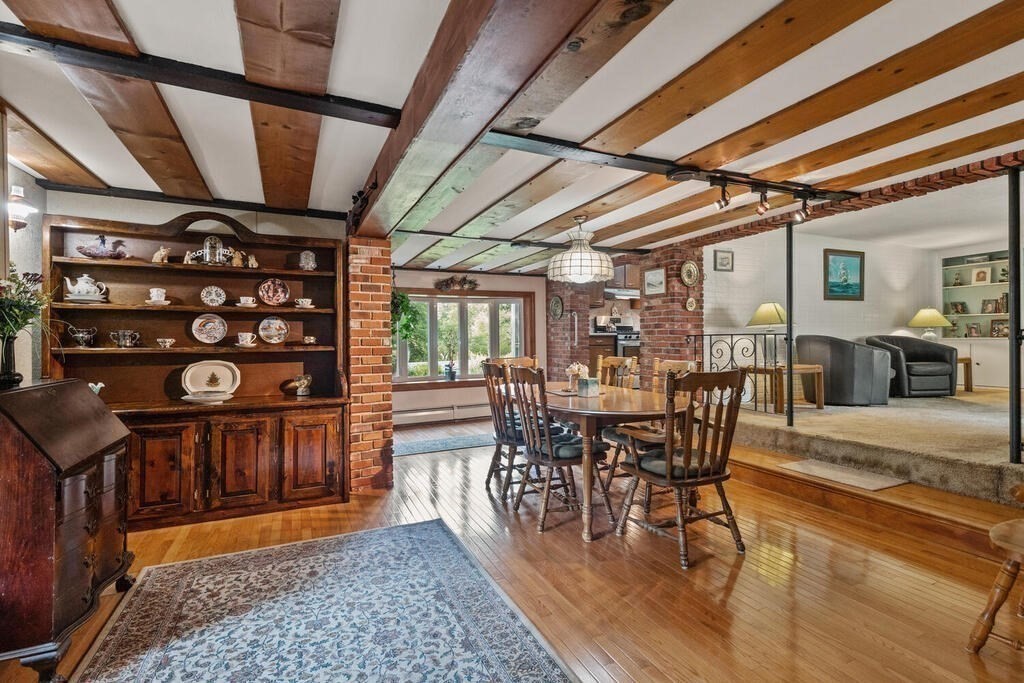 306 Andover Road Billerica, MA 01821 - Photo 9 of 42 a view of a dining room with furniture window and outside view