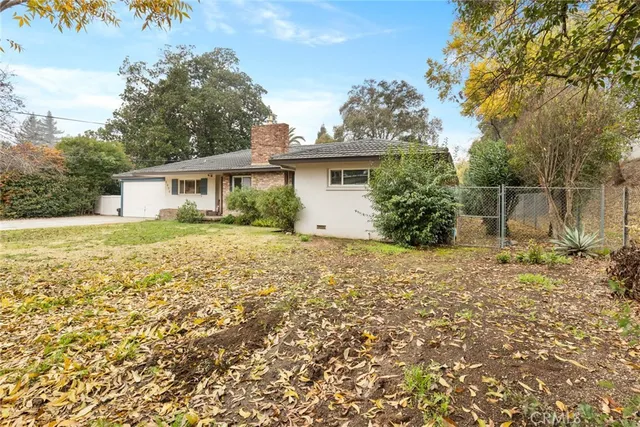 a house view with a outdoor space