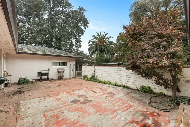 a backyard of a house with seating space