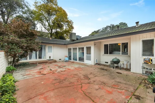 a backyard of a house with seating space