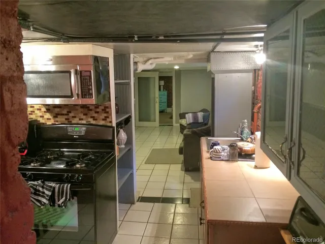 a bedroom with a bed and flat screen tv