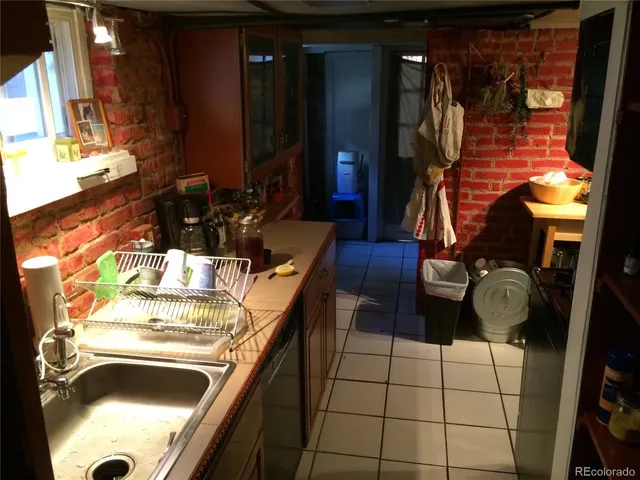 a bathroom with a sink and a shower
