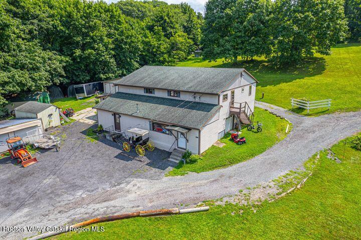 104 Lord Avenue Troy, NY 12180 - Photo 6 of 10 an aerial view of a house with swimming pool and porch